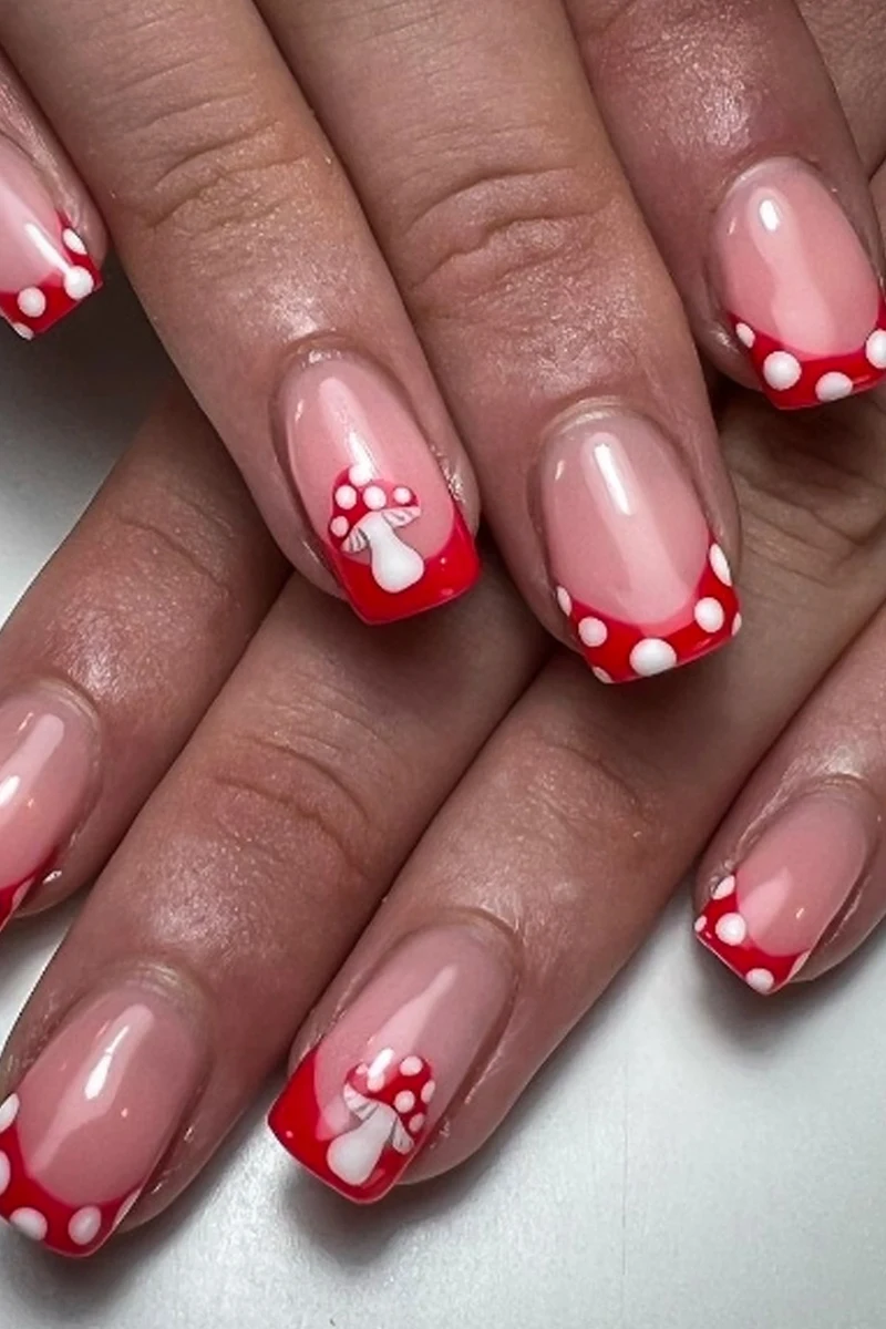 a close-up of woman's nails with minecraft inspired nail look