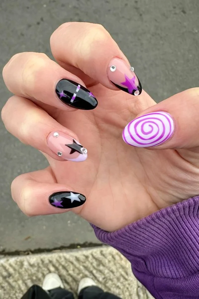 a close-up of woman's nails with minecraft inspired nail look