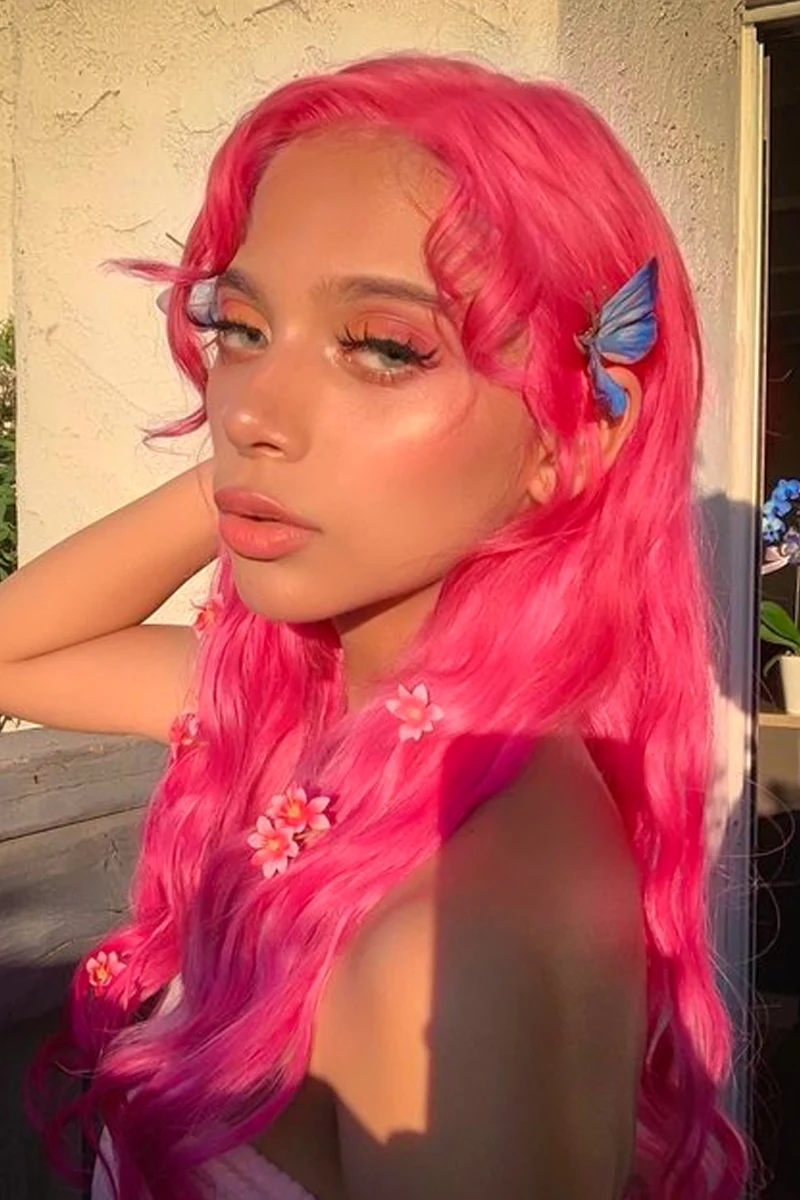 a portrait of a beautiful woman with a neon pinke hair